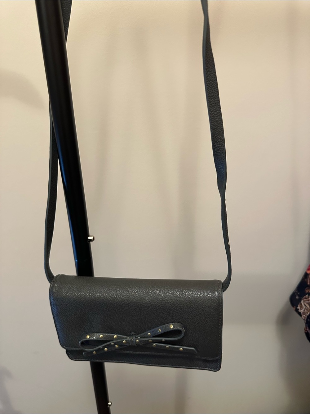 Classic Black Leather Crossbody Bag with Studded Bow